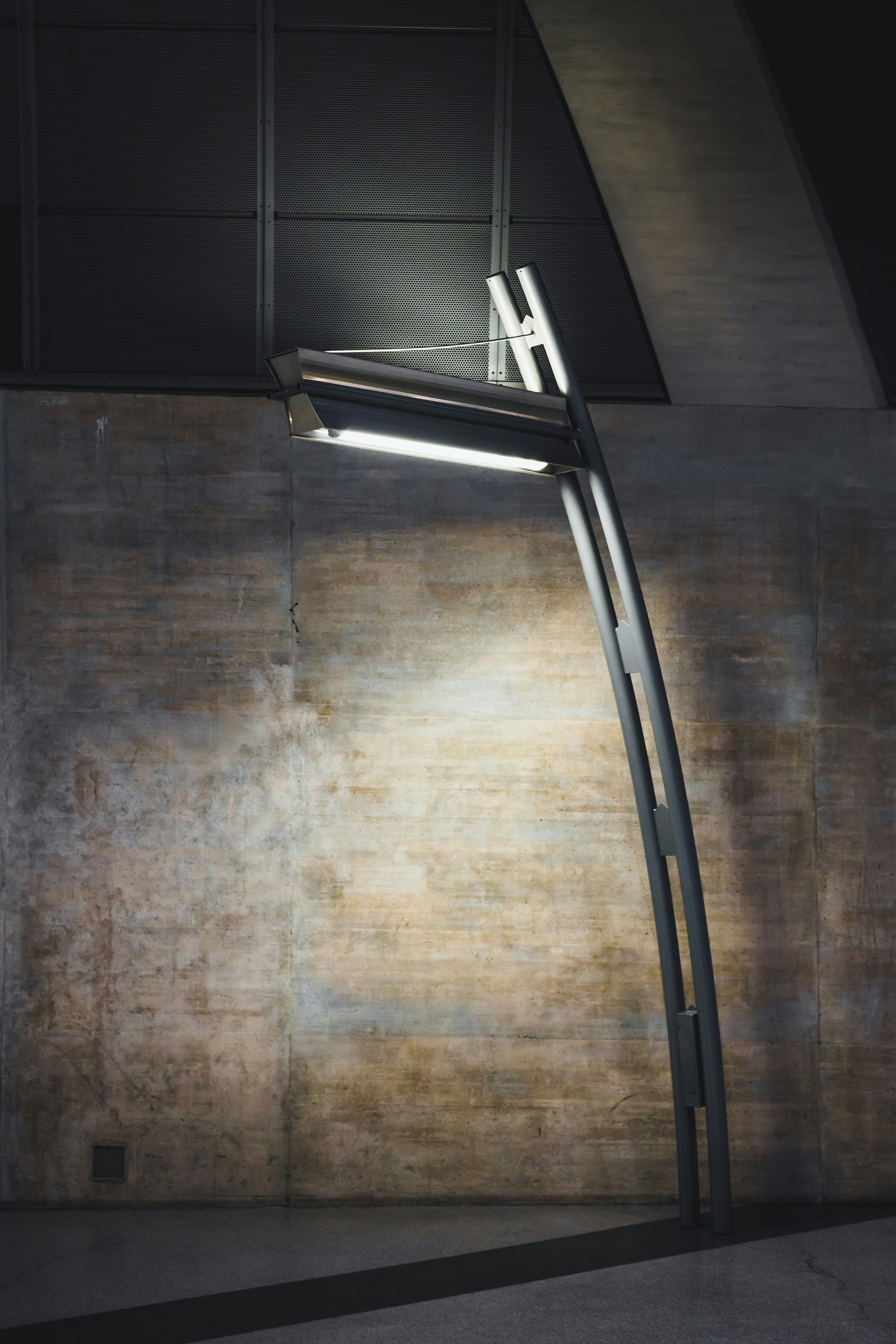 black and silver treadmill on brown wooden floor